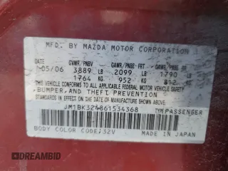 2006 Mazda 3 s with VIN JM1BK324861534368, listed as a Copart auction lot 41458435 with 147,841 mi miles and Salvage Title. Bid and sale history available at DreamBid. Image 12.