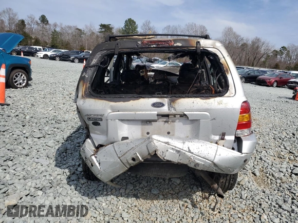 2005 Ford Escape Limited z VIN 1FMYU04115KA70415, wystawiony jako Copart lot #49111495 z przebiegiem Nie podano mil oraz Szkoda całkowita • Salvage title. Historia ofert i sprzedaży dostępna na DreamBid. Obrazek 6.