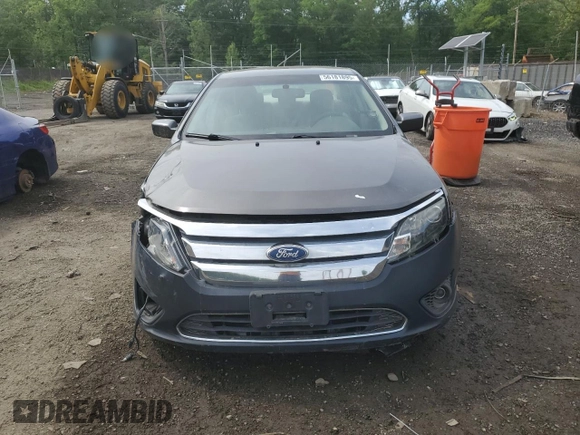 2010 Ford Fusion SE with VIN 3FAHP0HA2AR304143, listed as a Copart auction lot 56181895 with 136,936 mi miles and Salvage title. Bid and sale history available at DreamBid. Image 5.