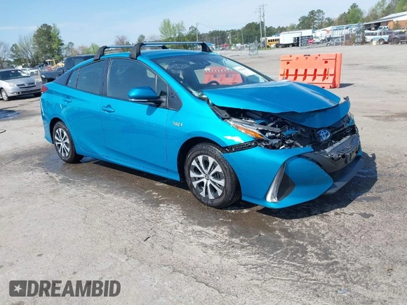 2021 Toyota Prius LE with VIN JTDKAMFP7M3180504, listed as a IAAI auction lot 41985409 with 56,617 mi miles and . Bid and sale history available at DreamBid. Image 1.
