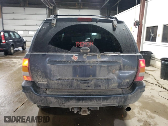 2001 Jeep Grand Cherokee Limited with VIN 1J4GW58N01C664996, listed as a Copart auction lot 58339825 with 288,153 mi miles and Salvage title. Bid and sale history available at DreamBid. Image 6.