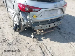 2014 Mazda 3 i Touring z VIN JM1BM1L78E1185248, wystawiony jako IAAI lot #40983056 z przebiegiem 140 911 mil mil oraz . Historia ofert i sprzedaży dostępna na DreamBid. Obrazek 6.