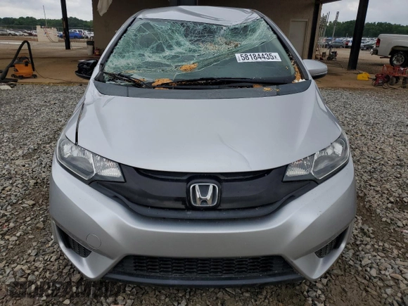 2015 Honda Fit LX z VIN 3HGGK5H58FM768130, wystawiony jako Copart lot #58184435 z przebiegiem 67 968 mil mil oraz Szkoda całkowita • Salvage title. Historia ofert i sprzedaży dostępna na DreamBid. Obrazek 5.