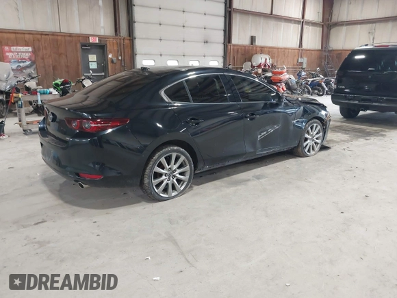 2020 Mazda 3 Premium with VIN 3MZBPBEM4LM123018, listed as a IAAI auction lot 41967652 with 84,642 mi miles and . Bid and sale history available at DreamBid. Image 4.