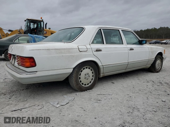 1989 Mercedes-Benz 560 with VIN WDBCA39E0KA469417, listed as a Copart auction lot 43929215 with 52,559 mi miles and Salvage Title. Bid and sale history available at DreamBid. Image 3.