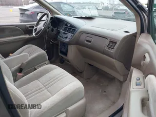 1999 Toyota Sienna LE with VIN 4T3ZF13C5XU121145, listed as a IAAI auction lot 41721171 with 229,760 mi miles and . Bid and sale history available at DreamBid. Image 5.