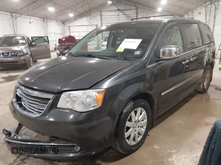2011 Chrysler Town & Country Touring-L with VIN 2A4RR8DG1BR783206, listed as a IAAI auction lot 41530267 with 128,237 mi miles. Bid and sale history available at carsss.com. Image 2.
