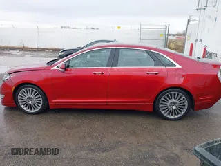 2014 Lincoln MKZ z VIN 3LN6L2J9XER806263, wystawiony jako IAAI lot #41794501 z przebiegiem 96 845 mil mil oraz . Historia ofert i sprzedaży dostępna na DreamBid. Obrazek 14.