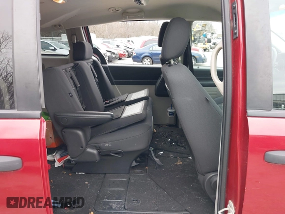 2008 Dodge Grand Caravan SE with VIN 1D8HN44H08B191755, listed as a IAAI auction lot 41895632 with 99,475 mi miles and . Bid and sale history available at DreamBid. Image 8.
