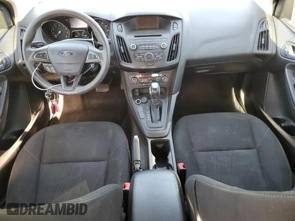 2016 Ford Focus SE with VIN 1FADP3FE8GL381855, listed as a Copart auction lot 57366645 with 104,709 mi miles and Salvage title. Bid and sale history available at DreamBid. Image 8.
