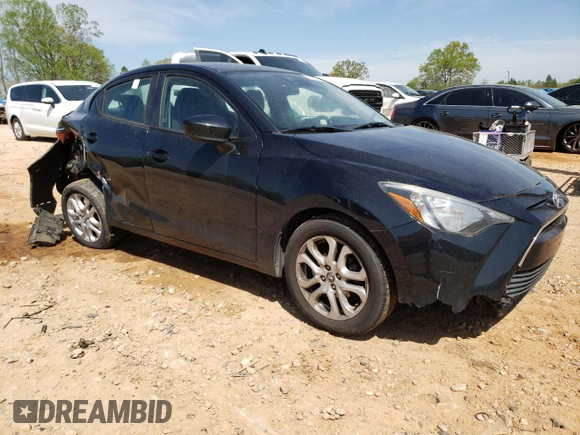 2018 Toyota Yaris with VIN 3MYDLBYV0JY326720, listed as a Copart auction lot 52027505 with 105,127 mi miles and Salvage Title. Bid and sale history available at DreamBid. Image 4.