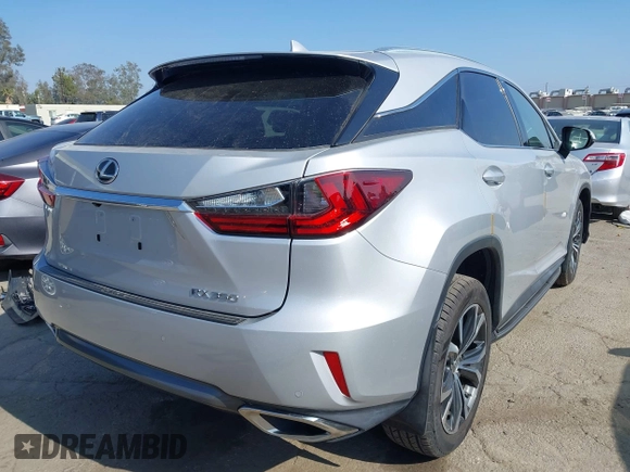 2017 Lexus RX 350 with VIN 2T2ZZMCA7HC061786, listed as a IAAI auction lot 42800283 with 31,300 mi miles and . Bid and sale history available at DreamBid. Image 4.