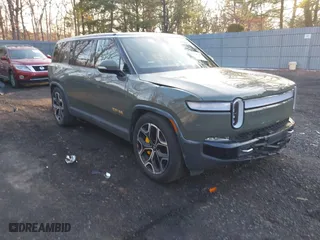 2022 Rivian R1S Launch Edition with VIN 7PDSGABL4NN000409, listed as a IAAI auction lot 41433164 with 39,603 mi miles. Bid and sale history available at carsss.com. Image 1.
