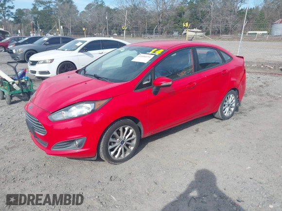 2014 Ford Fiesta SE with VIN 3FADP4BJ8EM170837, listed as a IAAI auction lot 41656071 with 128,334 mi miles and . Bid and sale history available at DreamBid. Image 2.