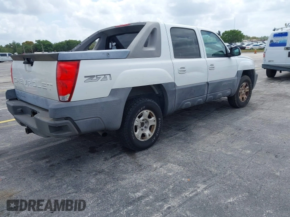 2004 Chevrolet Avalanche Z71 with VIN 3GNEK12T54G209885, listed as a IAAI auction lot 41955338 with 243,811 mi miles. Bid and sale history available at carsss.com. Image 4.