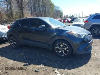 2019 Toyota C-HR XLE with VIN JTNKHMBXXK1019814, listed as a IAAI auction lot 41884485 with 53,101 mi miles. Bid and sale history available at carsss.com. Image 13.
