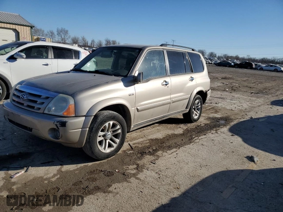 2004 Suzuki XL7 LX z VIN JS3TX92V344114452, wystawiony jako Copart lot #42338075 z przebiegiem 158 359 mil mil oraz Szkody całkowita. Historia ofert i sprzedaży dostępna na DreamBid. Obrazek 1.