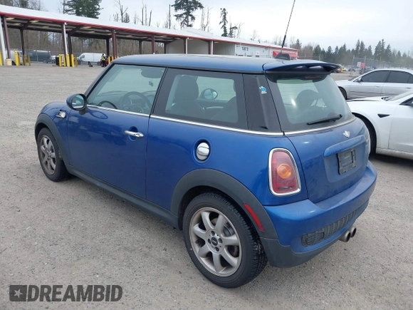2007 MINI Hardtop S with VIN WMWMF73527TL91061, listed as a IAAI auction lot 41842104 with 65,259 mi miles and . Bid and sale history available at DreamBid. Image 3.
