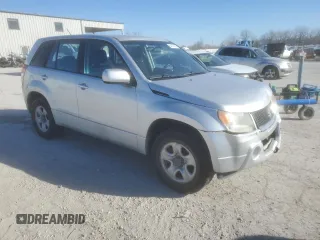 2006 Suzuki Grand Vitara z VIN JS3TE941364101882, wystawiony jako Copart lot #84143364 z przebiegiem 148 560 mil mil oraz Szkody całkowita. Historia ofert i sprzedaży dostępna na DreamBid. Obrazek 4.