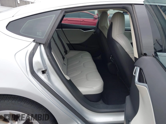 2016 Tesla Model S 90D with VIN 5YJSA1E23GF138925, listed as a IAAI auction lot 42408676 with 48,399 mi miles and . Bid and sale history available at DreamBid. Image 8.