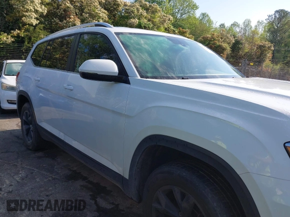 2018 Volkswagen Atlas SE with VIN 1V2CR2CAXJC548220, listed as a IAAI auction lot 41983957 with 118,371 mi miles and . Bid and sale history available at DreamBid. Image 13.