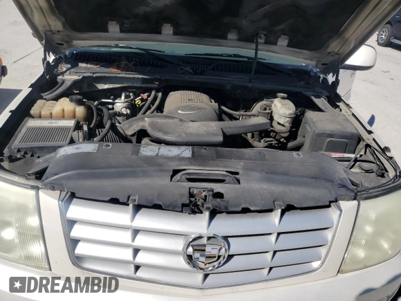 2003 Cadillac Escalade с VIN 1GYEC63T63R290034, выставлен на аукционе Copart как лот 46844735 с пробегом 304 433 миль миль и Чистый • Clean title. История ставок и продаж доступна на DreamBid. Изображение 12.