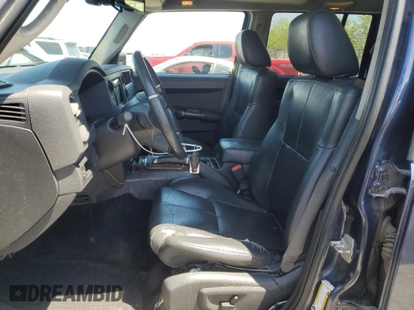 2008 Jeep Commander Limited z VIN 1J8HG58298C243410, wystawiony jako Copart lot #53682205 z przebiegiem 181 388 mil mil oraz Szkoda całkowita • Salvage title. Historia ofert i sprzedaży dostępna na DreamBid. Obrazek 7.
