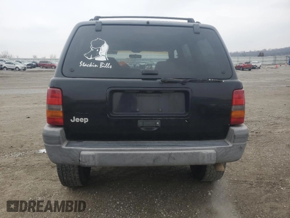 1998 Jeep Grand Cherokee Laredo with VIN 1J4GZ58S2WC281923, listed as a Copart auction lot 44010885 with 210,959 mi miles and Salvage Title. Bid and sale history available at carsss.com. Image 6.