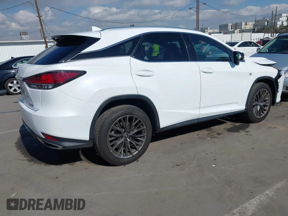 2021 Lexus RX with VIN 2T2SZMDA8MC289158, listed as a IAAI auction lot 41403874 with 84,981 mi miles. Bid and sale history available at carsss.com. Image 4.