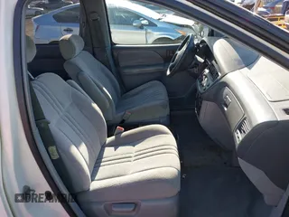 2000 Toyota Sienna LE z VIN 4T3ZF13C3YU278612, wystawiony jako IAAI lot #42018517 z przebiegiem 165 147 mil mil oraz . Historia ofert i sprzedaży dostępna na DreamBid. Obrazek 5.