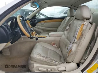 2003 Lexus SC 430 с VIN JTHFN48Y730040964, выставлен на аукционе Copart как лот 47684345 с пробегом 185 415 миль миль и Списание • Salvage title. История ставок и продаж доступна на DreamBid. Изображение 7.