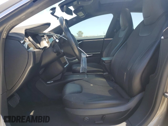 2016 Tesla Model S 90D z VIN 5YJSA1E20GF153799, wystawiony jako Copart lot #56104665 z przebiegiem 115 674 mil mil oraz Szkoda całkowita • Salvage title. Historia ofert i sprzedaży dostępna na DreamBid. Obrazek 7.