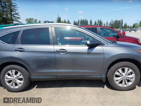 2014 Honda CR-V EX-L with VIN 5J6RM4H79EL077096, listed as a IAAI auction lot 42153513 with 104,972 mi miles and . Bid and sale history available at DreamBid. Image 13.