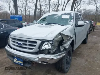 2002 Ford F-150 XL with VIN 1FTRX17212NA45843, listed as a IAAI auction lot 41575856 with 136,570 mi miles. Bid and sale history available at carsss.com. Image 2.