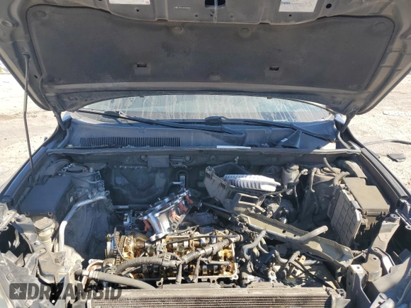 2007 Toyota RAV4 Sport z VIN JTMZK32V076009221, wystawiony jako Copart lot #75331574 z przebiegiem 214 017 mil mil oraz Szkoda całkowita • Salvage title. Historia ofert i sprzedaży dostępna na DreamBid. Obrazek 12.