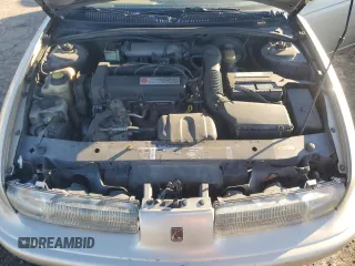 1999 Saturn SL with VIN 1G8ZK5270XZ147170, listed as a Copart auction lot 42169385 with 141,100 mi miles and Clean title. Bid and sale history available at DreamBid. Image 11.