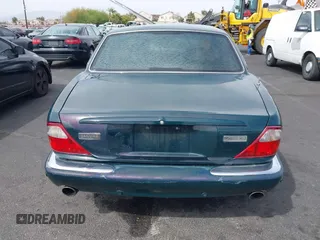 2003 Jaguar XJ with VIN SAJDA15B73MF53499, listed as a IAAI auction lot 41896445 with 95,055 mi miles and . Bid and sale history available at DreamBid. Image 13.