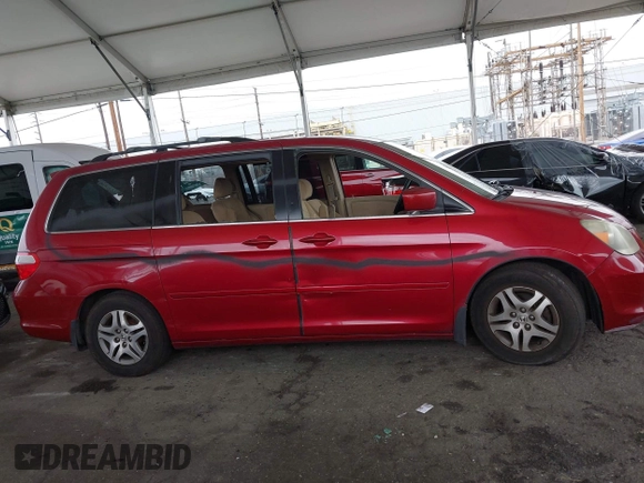 2005 Honda Odyssey EX with VIN 5FNRL38485B411954, listed as a IAAI auction lot 42039034 with 220,966 mi miles. Bid and sale history available at carsss.com. Image 13.