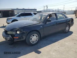 1994 Toyota Camry LE z VIN JT2GK12E5R0001867, wystawiony jako Copart lot #52118815 z przebiegiem 193 745 mil mil oraz Szkoda całkowita • Salvage title. Historia ofert i sprzedaży dostępna na DreamBid. Obrazek 1.