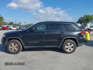 2014 Jeep Grand Cherokee Laredo with VIN 1C4RJEAG6EC136832, listed as a IAAI auction lot 42020647 with 151,639 mi miles. Bid and sale history available at carsss.com. Image 14.