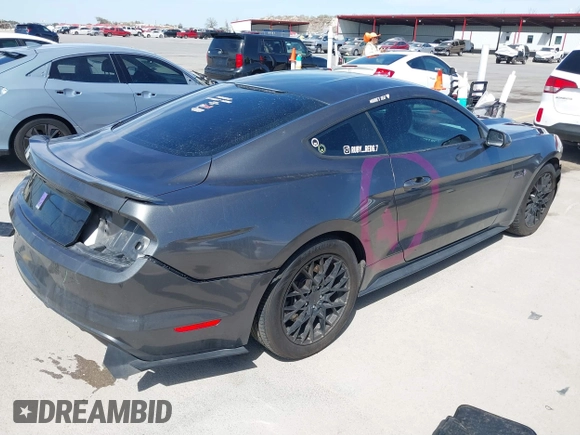 2015 Ford Mustang GT with VIN 1FA6P8CF4F5417899, listed as a IAAI auction lot 41816488 with 128,372 mi miles and . Bid and sale history available at carsss.com. Image 4.