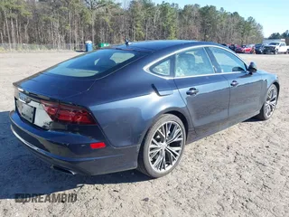 2016 Audi A7 3.0 Premium Plus with VIN WAUWGAFC4GN144738, listed as a IAAI auction lot 41580879 with 146,375 mi miles. Bid and sale history available at carsss.com. Image 4.