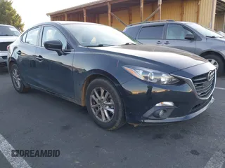 2015 Mazda 3 i Grand Touring with VIN JM1BM1W71F1226283, listed as a IAAI auction lot 41450177 with 136,621 mi miles and . Bid and sale history available at DreamBid. Image 1.