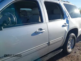 2013 GMC Yukon SLT with VIN 1GKS1CE04DR180881, listed as a IAAI auction lot 41647032 with 187,228 mi miles. Bid and sale history available at carsss.com. Image 6.