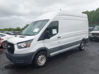 2021 Ford Transit Cargo with VIN 1FTBW1X84MKA98047, listed as a IAAI auction lot 42313747 with 65,600 mi miles and . Bid and sale history available at DreamBid. Image 2.