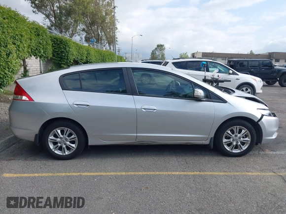 2010 Honda Insight EX with VIN JHMZE2H75AS003695, listed as a IAAI auction lot 42119429 with 90,901 mi miles and . Bid and sale history available at DreamBid. Image 13.