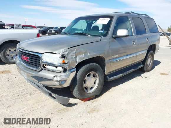 2003 GMC Yukon SLT with VIN 1GKEC13V33R298333, listed as a IAAI auction lot 41582447 with 166,047 mi miles. Bid and sale history available at carsss.com. Image 17.
