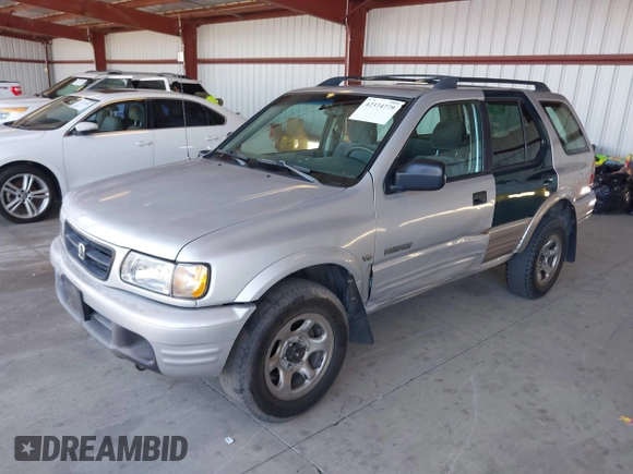 2001 Honda Passport LX z VIN 4S6CK58WX14402974, wystawiony jako IAAI lot #42374779 z przebiegiem 214 931 mil mil oraz . Historia ofert i sprzedaży dostępna na DreamBid. Obrazek 2.