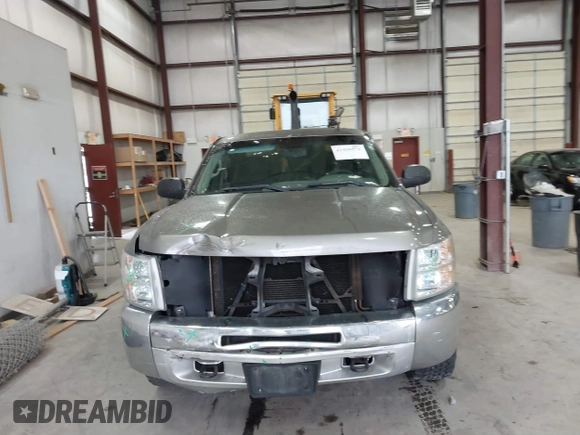 2013 Chevrolet Silverado 1500 LS with VIN 3GCPKREA8DG219773, listed as a IAAI auction lot 41436574 with 103,486 mi miles and . Bid and sale history available at DreamBid. Image 12.
