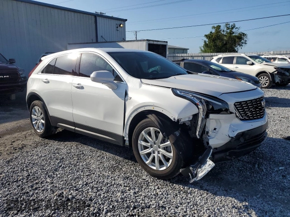 2023 Cadillac XT4 FWD Luxury with VIN 1GYAZAR42PF219114, listed as a Copart auction lot 61830125 with 23,508 mi miles and Salvage title. Bid and sale history available at DreamBid. Image 4.